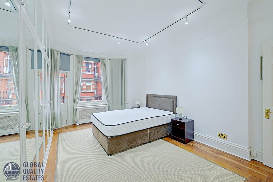 Principal bedroom with mirrored wardrobes