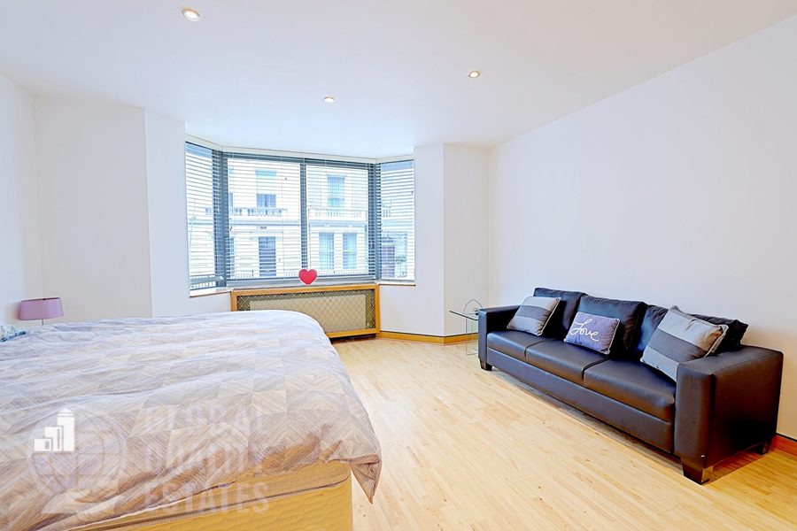 Principal bedroom, sofa and sitting area