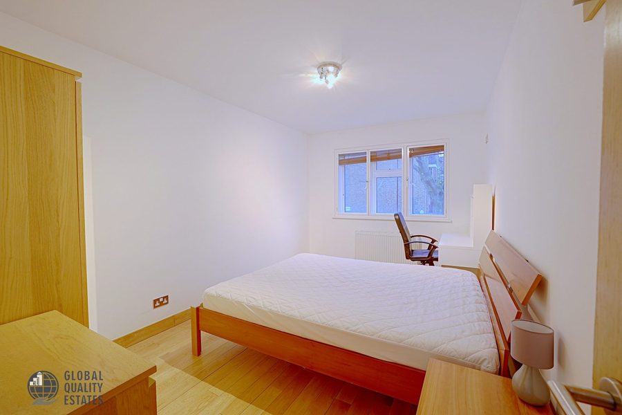 Second bedroom, desk and window