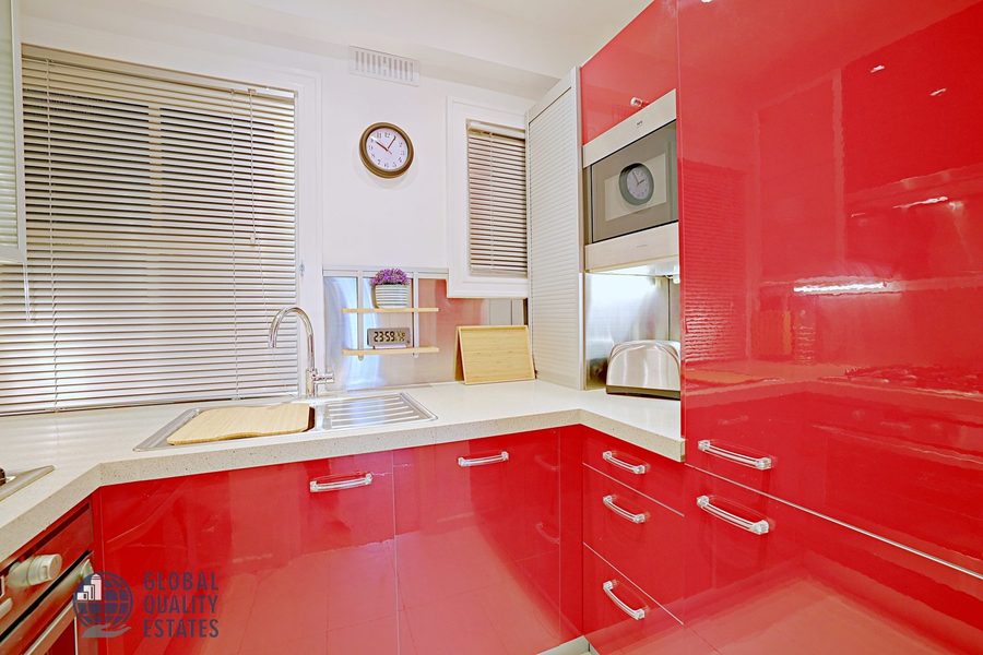 Kitchen with built-in oven and microwave