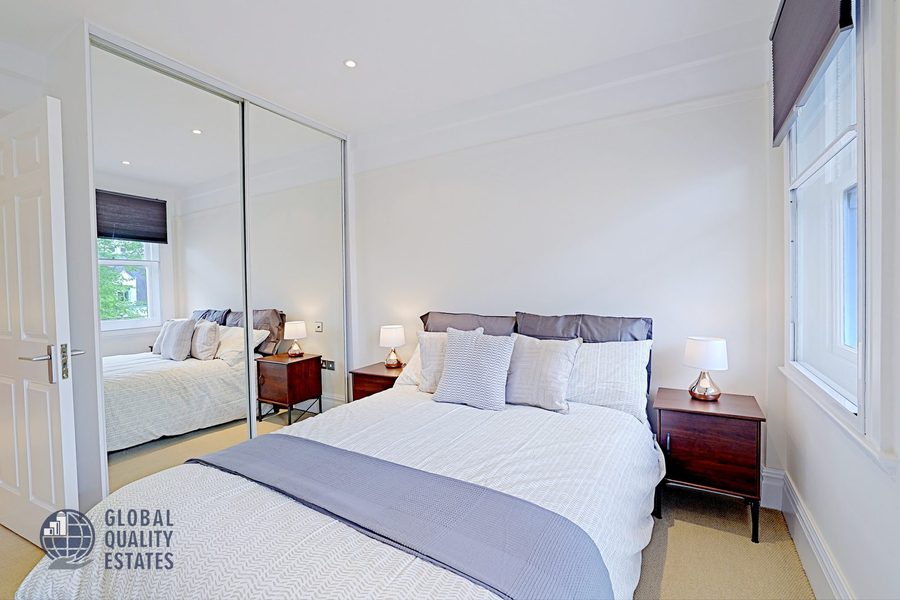 Principal bedroom with mirrored wardrobes