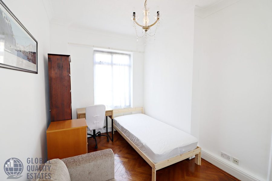 Bedroom, additional view towards the bed and desk